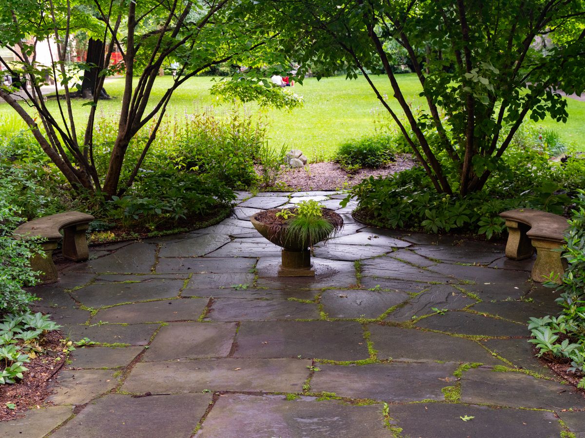 Illustrative stock example of a stone garden patio