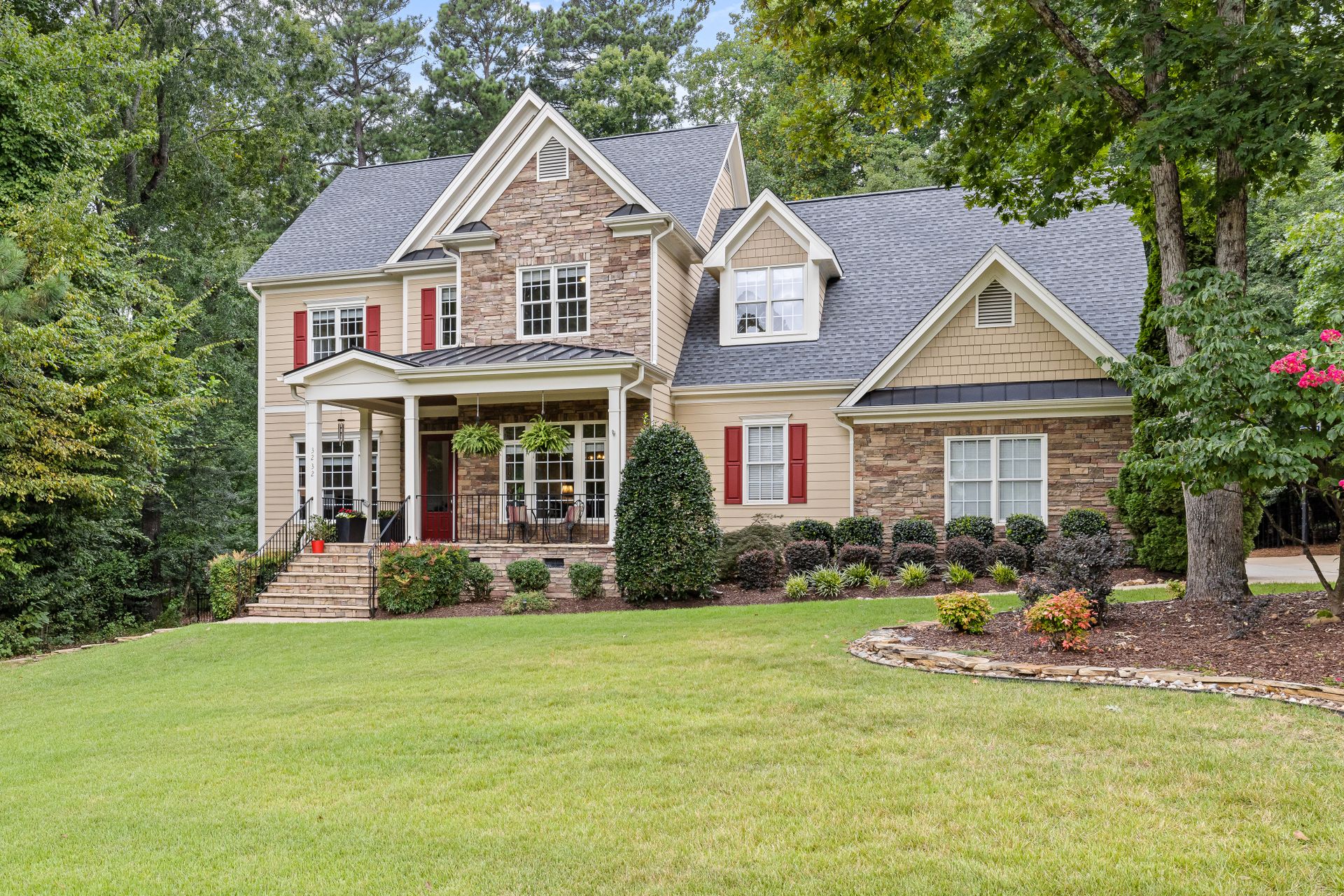 Illustrative stock photograph of an approachable suburban home and front yard